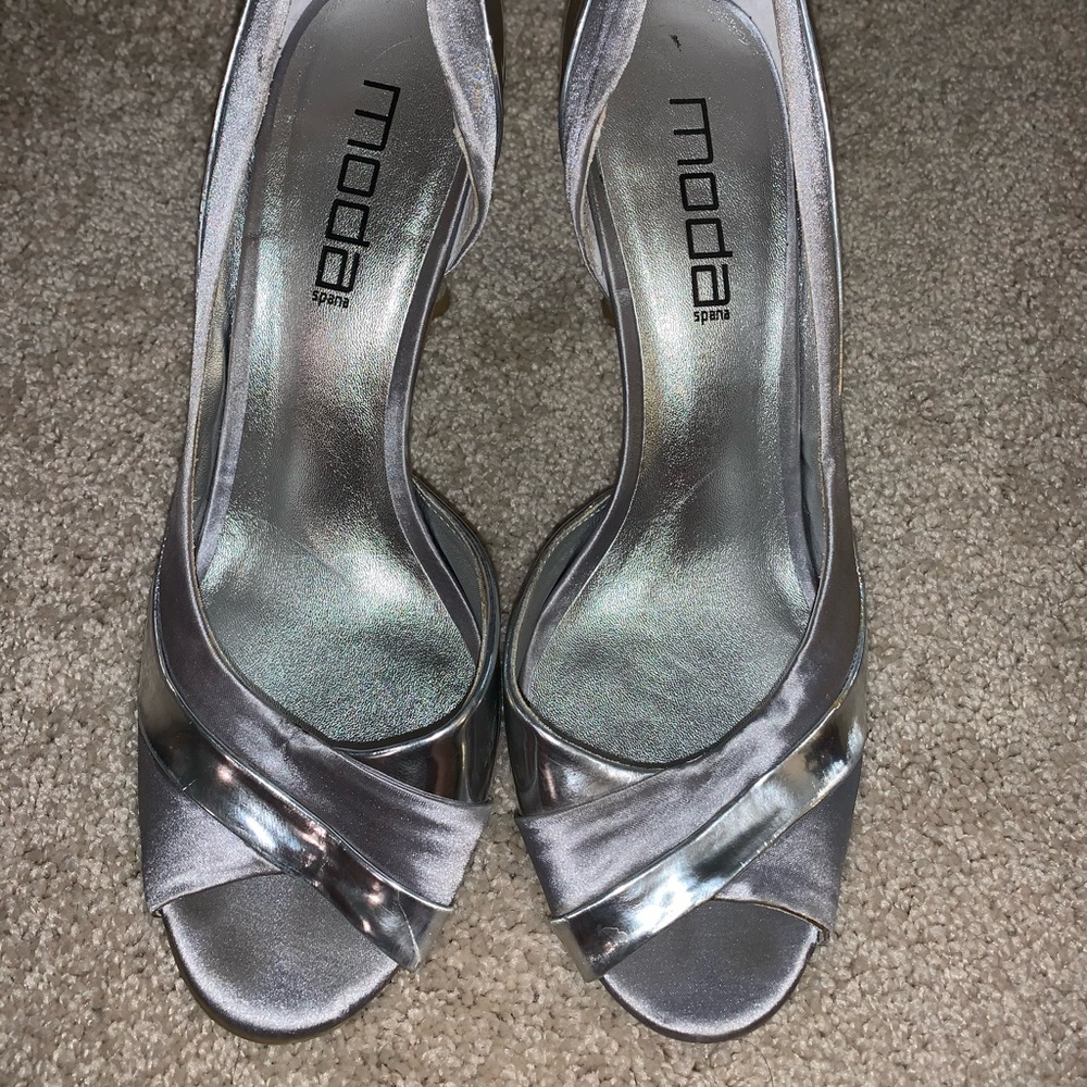 SOLD SILVER HEELS!